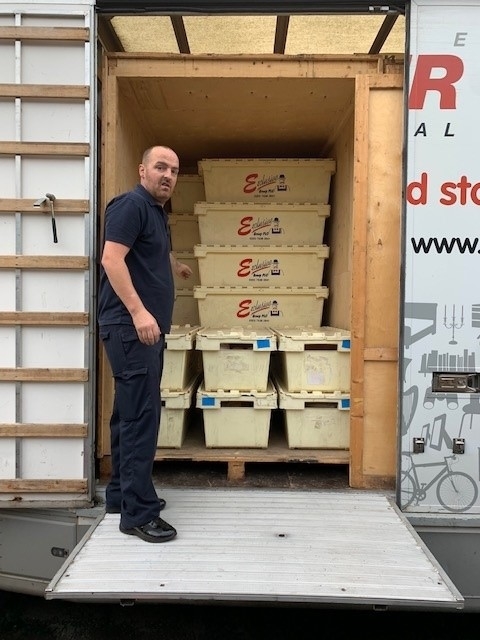 Book crates in container ready to go to storage